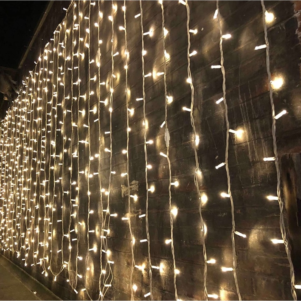 Magictec 300 LED Curtain String Light- warm white. Never used, no box.